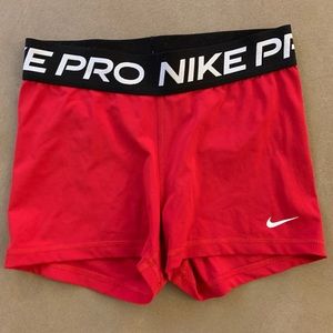 red nike pro shorts